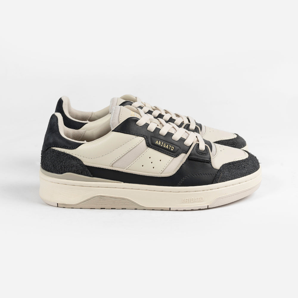 black axel arigato trainers